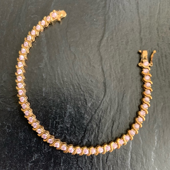 Elegant Gold and Pink Bracelet